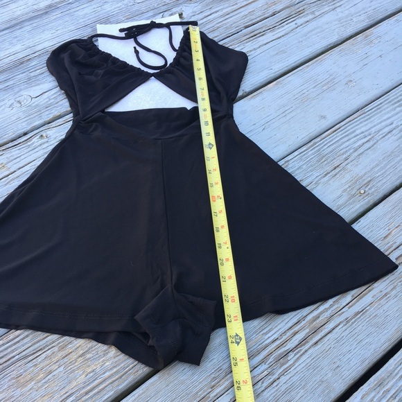 back less black romper with ties neck and open under chest. - Picture 3 of 8